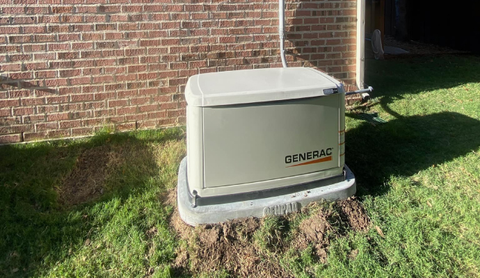 Beside the house, a generator has been installed.