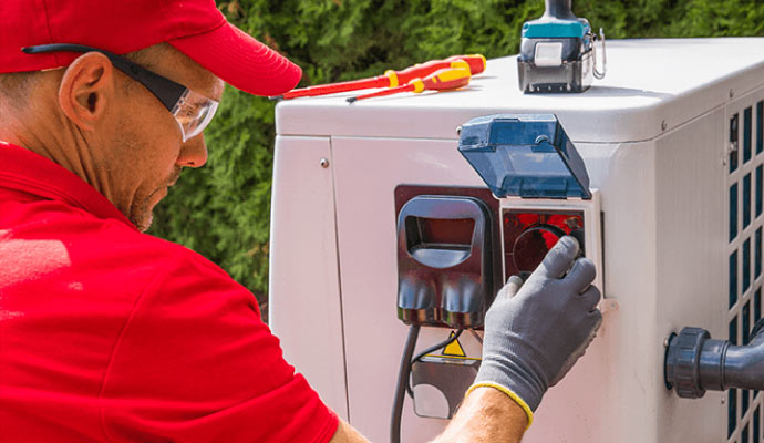 Expert repairing a generator