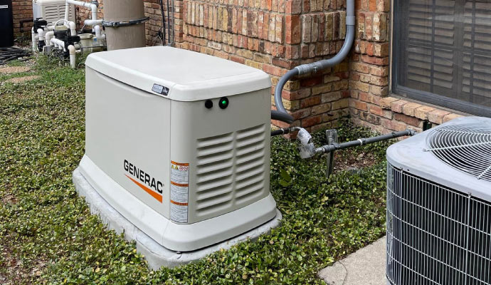 An installed Generac generator outside a building