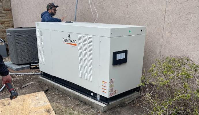 professionals performing maintenance on a generator