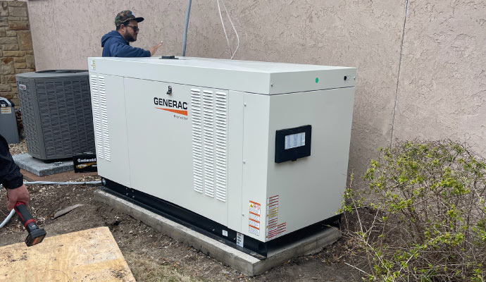 A person inspecting a generator