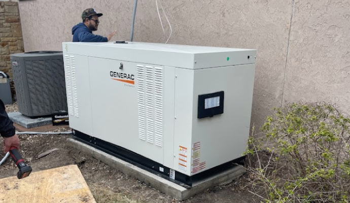 Professional team repairing a generator