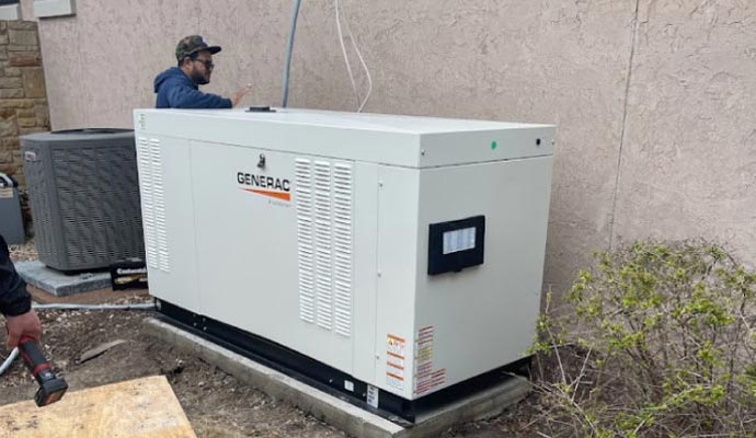 Expert team installing generator.